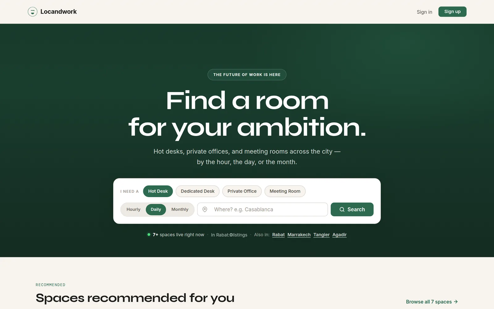 Locandwork home page: forest-green hero 'Find a room for your ambition.' with a workspace search box